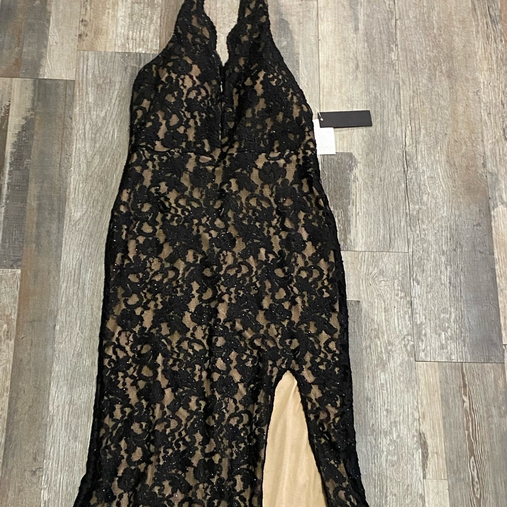 New with tags floor length dress.